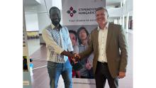handshake with the representative from Kenya